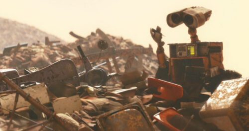 Wall-E inspecting all sorts of garbage that he found. Source: moviefone.com